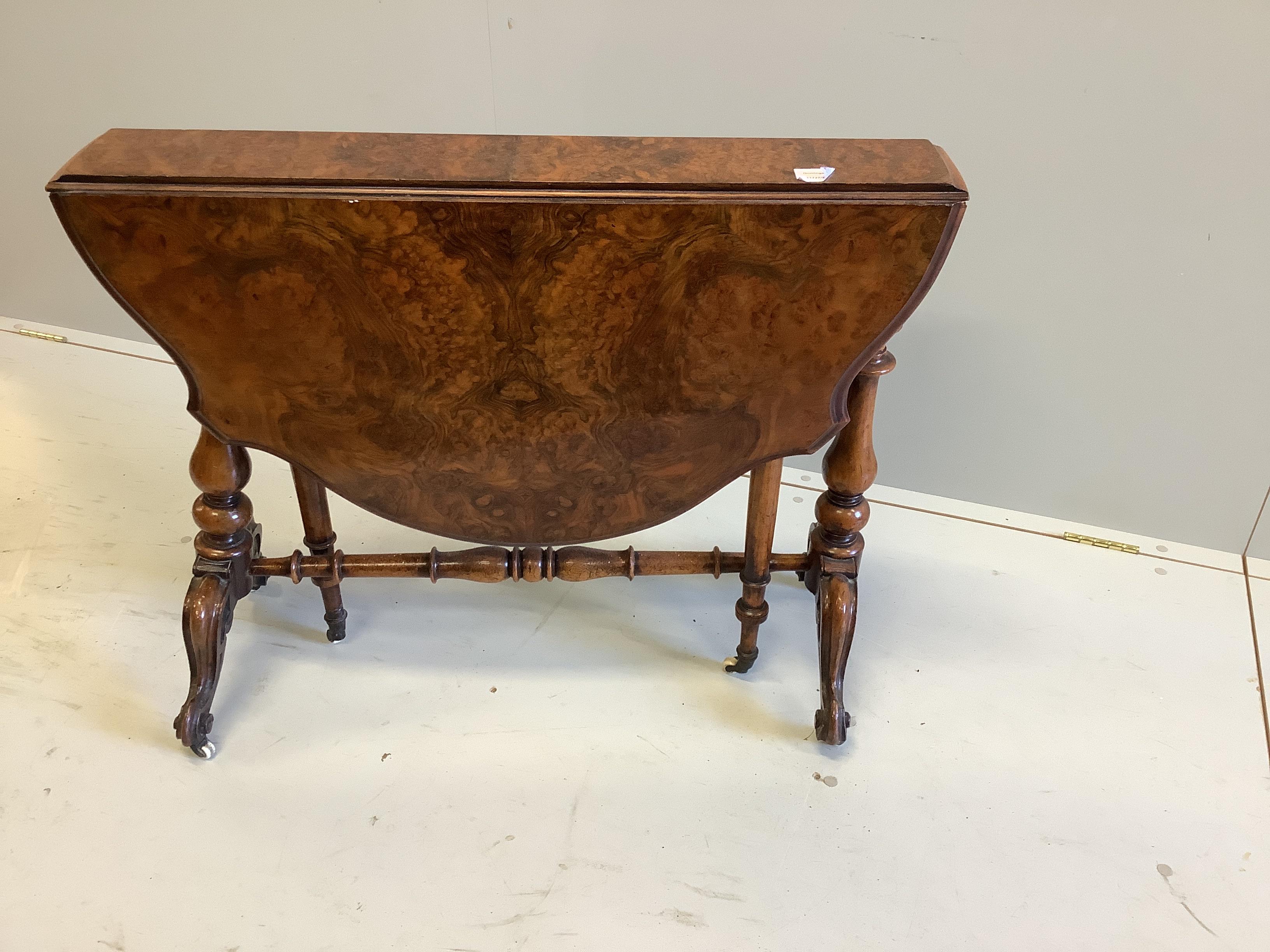 A Victorian burr walnut Sutherland tea table, width 90cm, depth 16cm, height 71cm (a.f.)